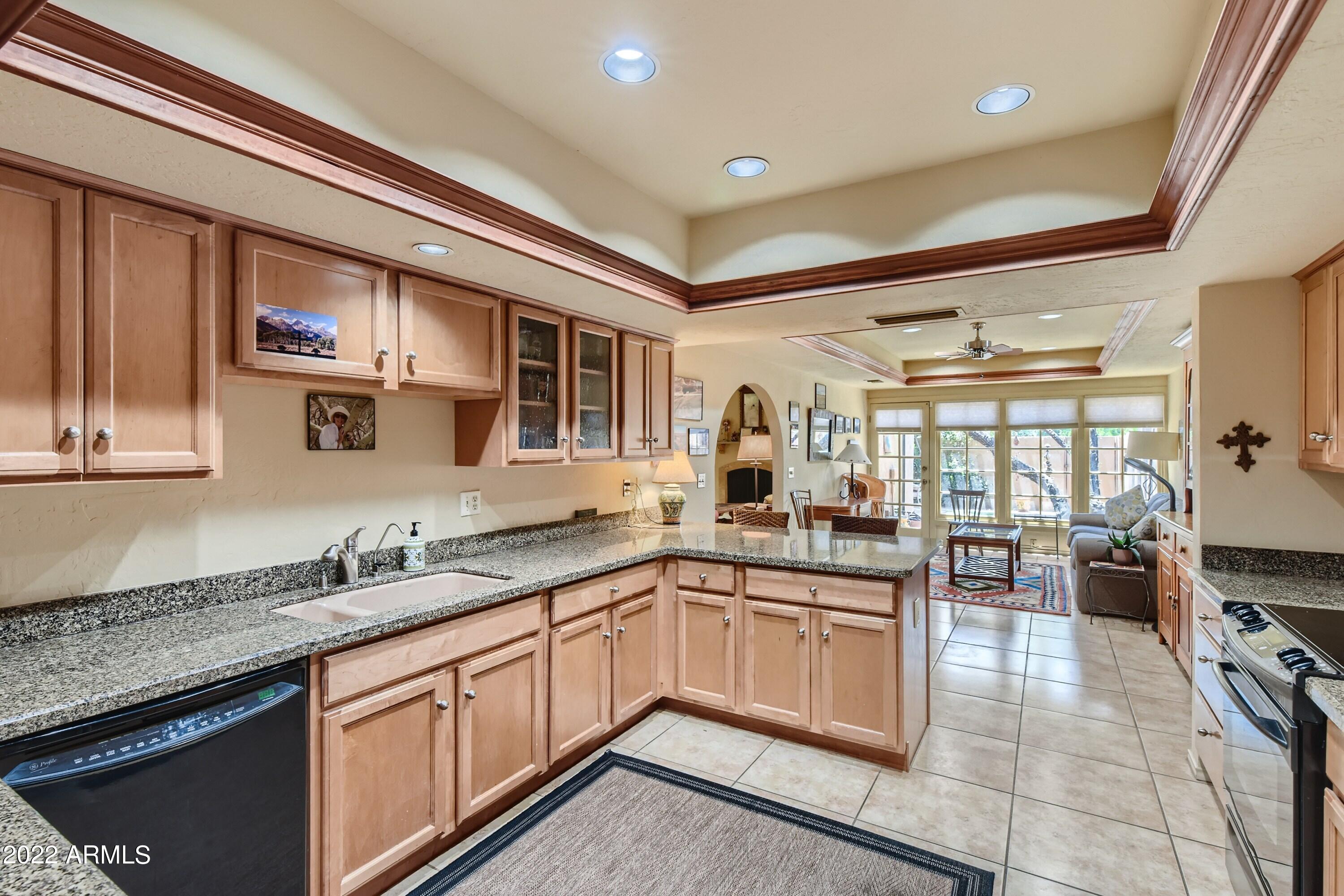 4438 East Camelback Road, Unit 152 Phoenix, AZ 85018 - Photo 10 of 30 Shaker cabinets & room to entertain