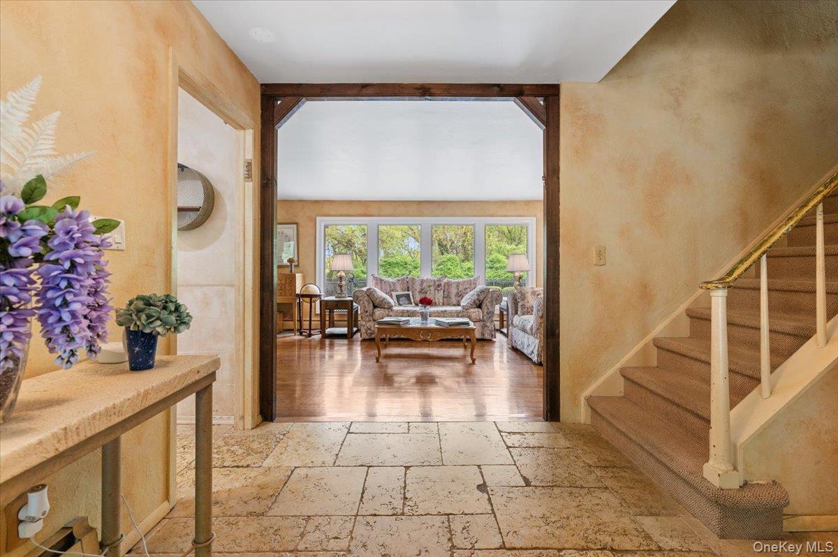 6 Apex Road Melville, NY 11747 - Photo 2 of 50 a view of dining room with furniture and garden view