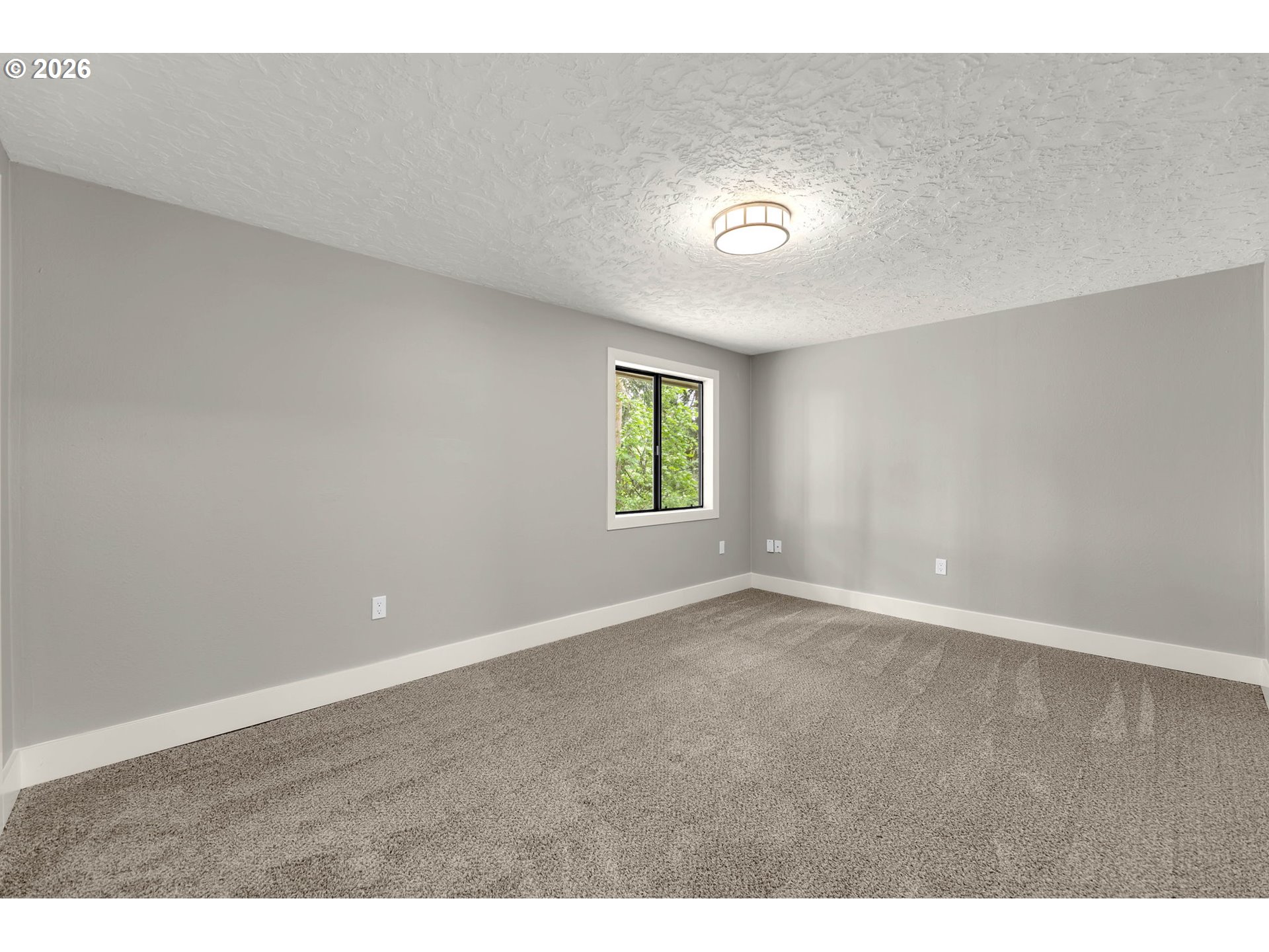 30921 Northwest Spencer Road La Center, WA 98642 - Photo 16 of 39 a view of an empty room with a window