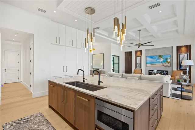 a utility room with cabinets