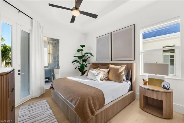 a view of a swimming pool with lounge chairs