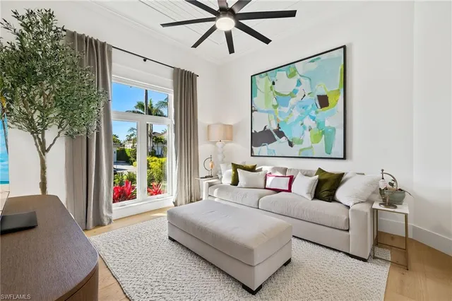 a view of swimming pool with outdoor seating