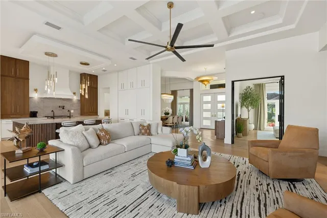 a bedroom with a large bed and a large window