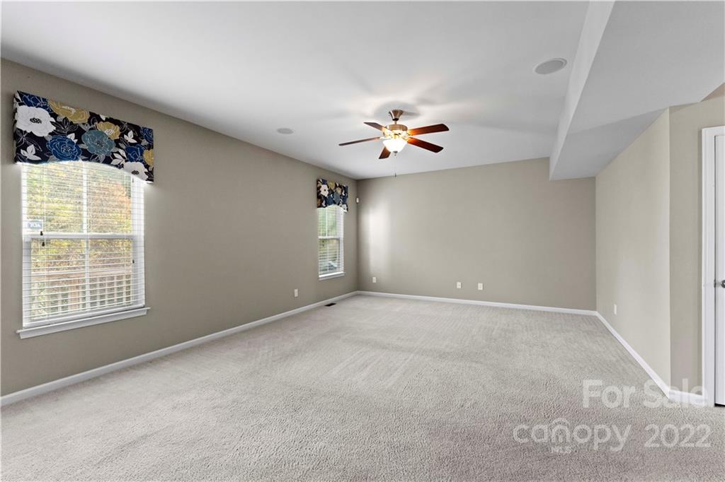7720 East Berkeley Road Denver, NC 28037 - Photo 17 of 40 a view of an empty room with a window