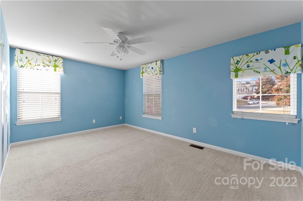 7720 East Berkeley Road Denver, NC 28037 - Photo 20 of 40 a view of an empty room with a window