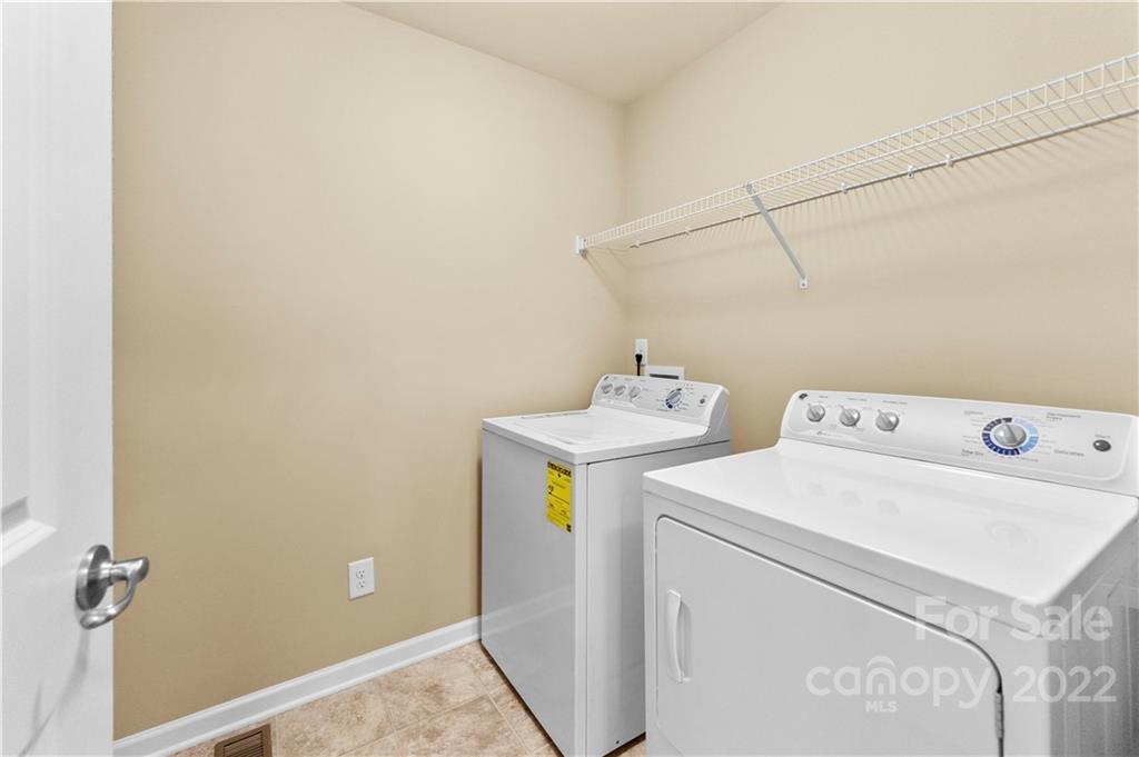7720 East Berkeley Road Denver, NC 28037 - Photo 23 of 40 a utility room with dryer and washer