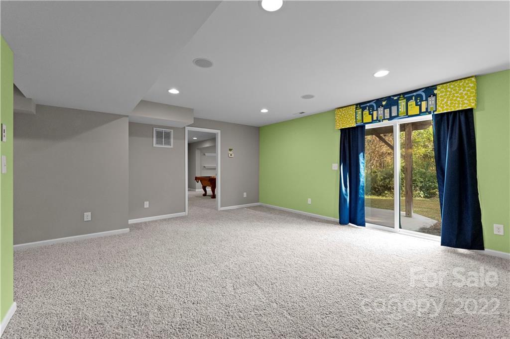 7720 East Berkeley Road Denver, NC 28037 - Photo 32 of 40 a view of empty room with floor to ceiling window