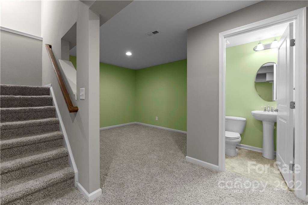 7720 East Berkeley Road Denver, NC 28037 - Photo 33 of 40 a view of a hallway with toilet and sink