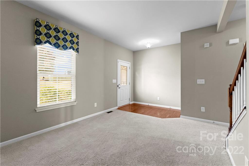 7720 East Berkeley Road Denver, NC 28037 - Photo 4 of 40 a view of an empty room with a window