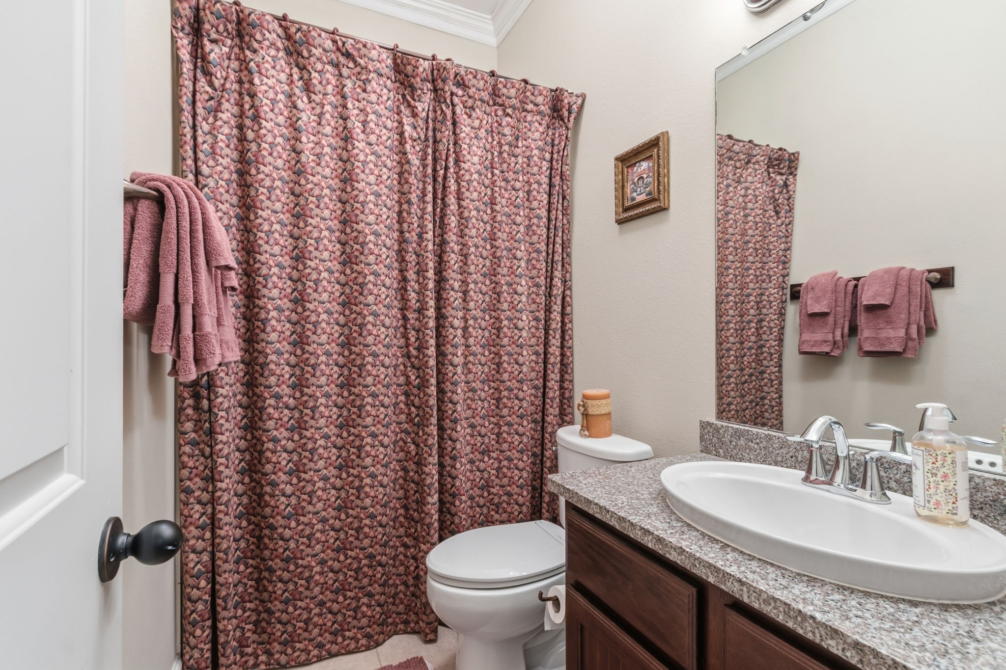 7514 Saddle Blanket Drive Waller, TX 77484 - Photo 30 of 50 Charming ensuite bathroom with ample counter space and a convenient tub/shower combo, perfect for the secondary bedroom.