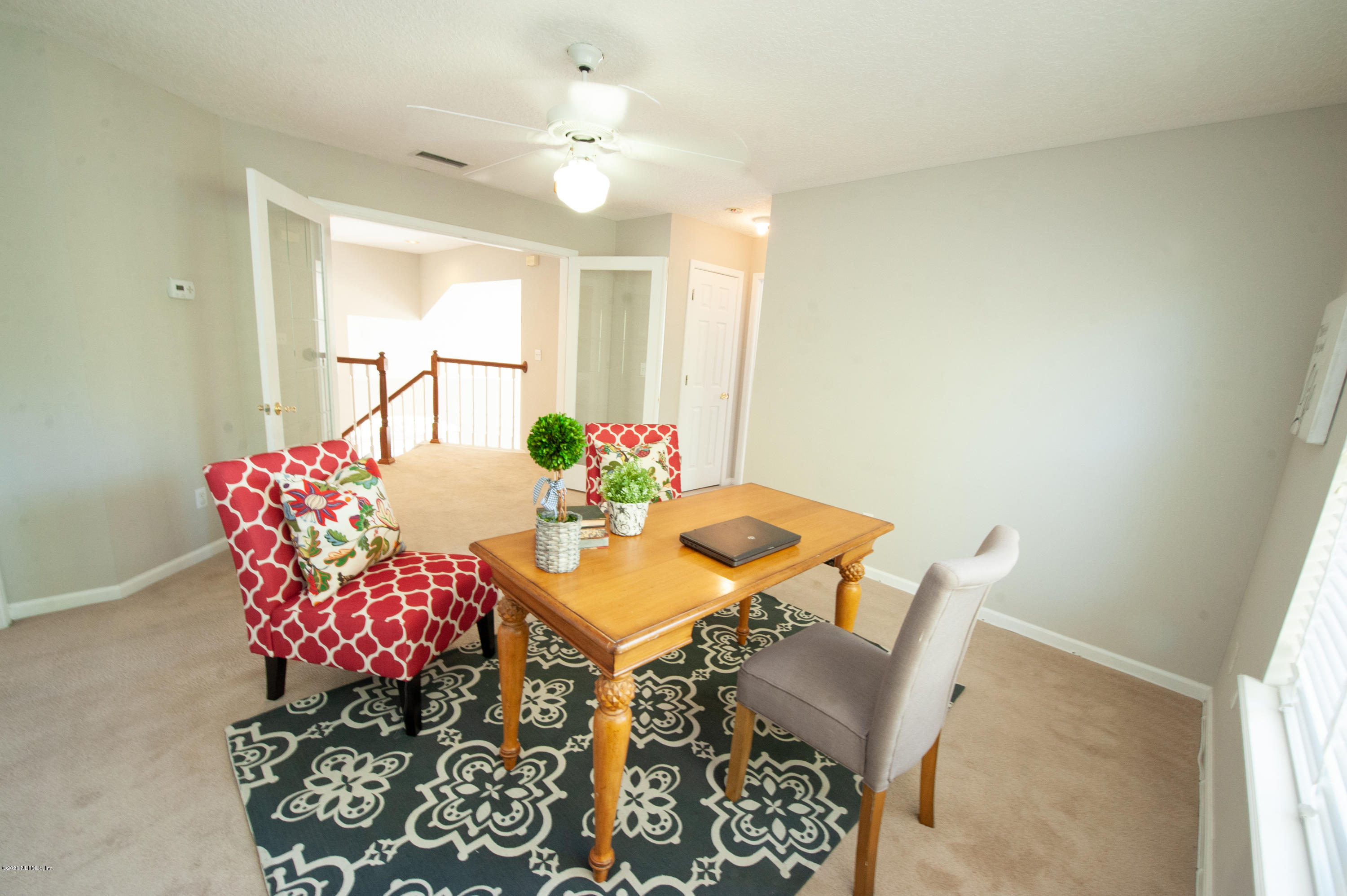 446 Big Tree Road Ponte Vedra Beach, FL 32082 - Photo 13 of 21 a view of a dining room with furniture and wooden floor