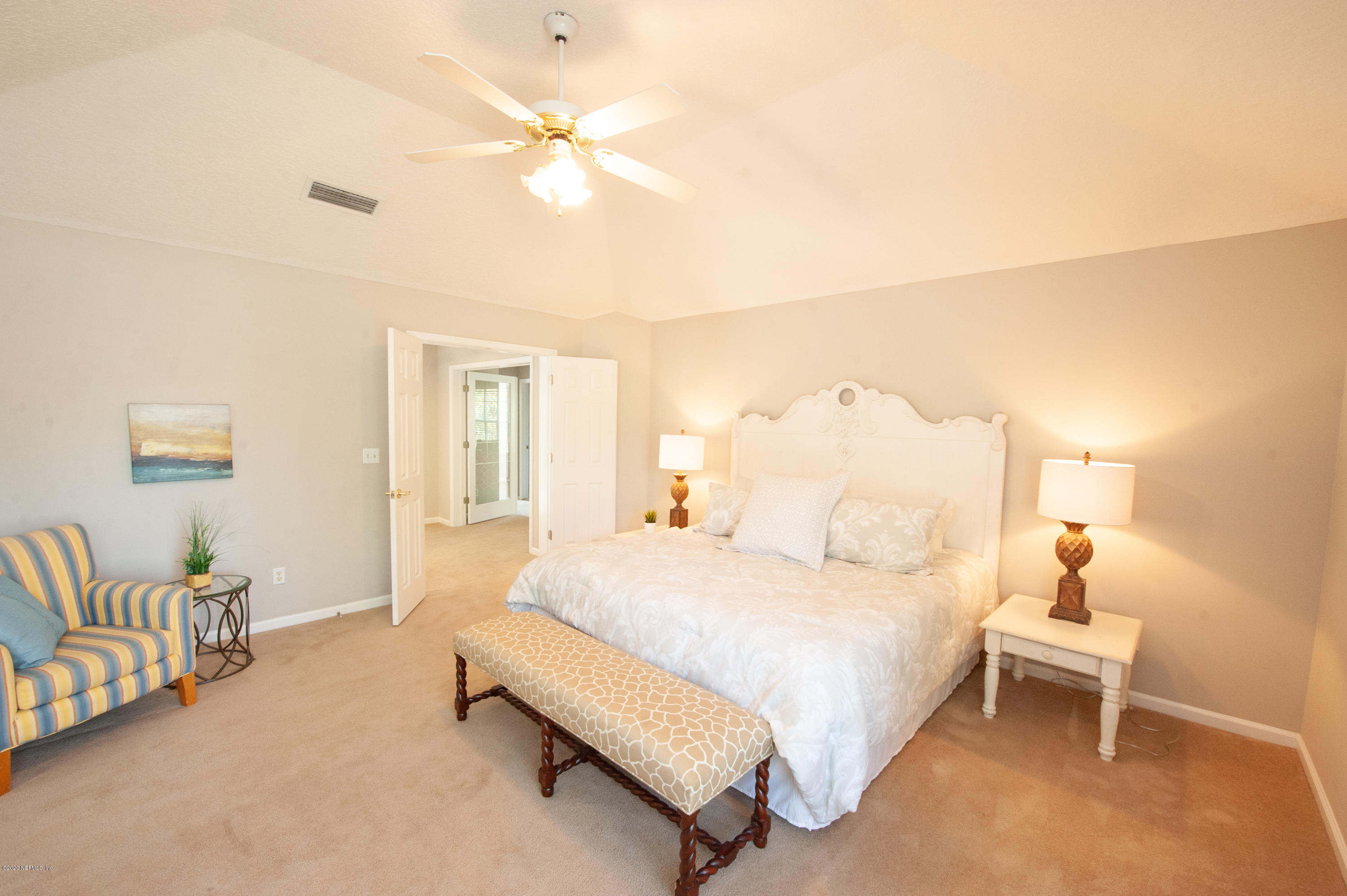 446 Big Tree Road Ponte Vedra Beach, FL 32082 - Photo 15 of 21 a bedroom with a bed and a couch