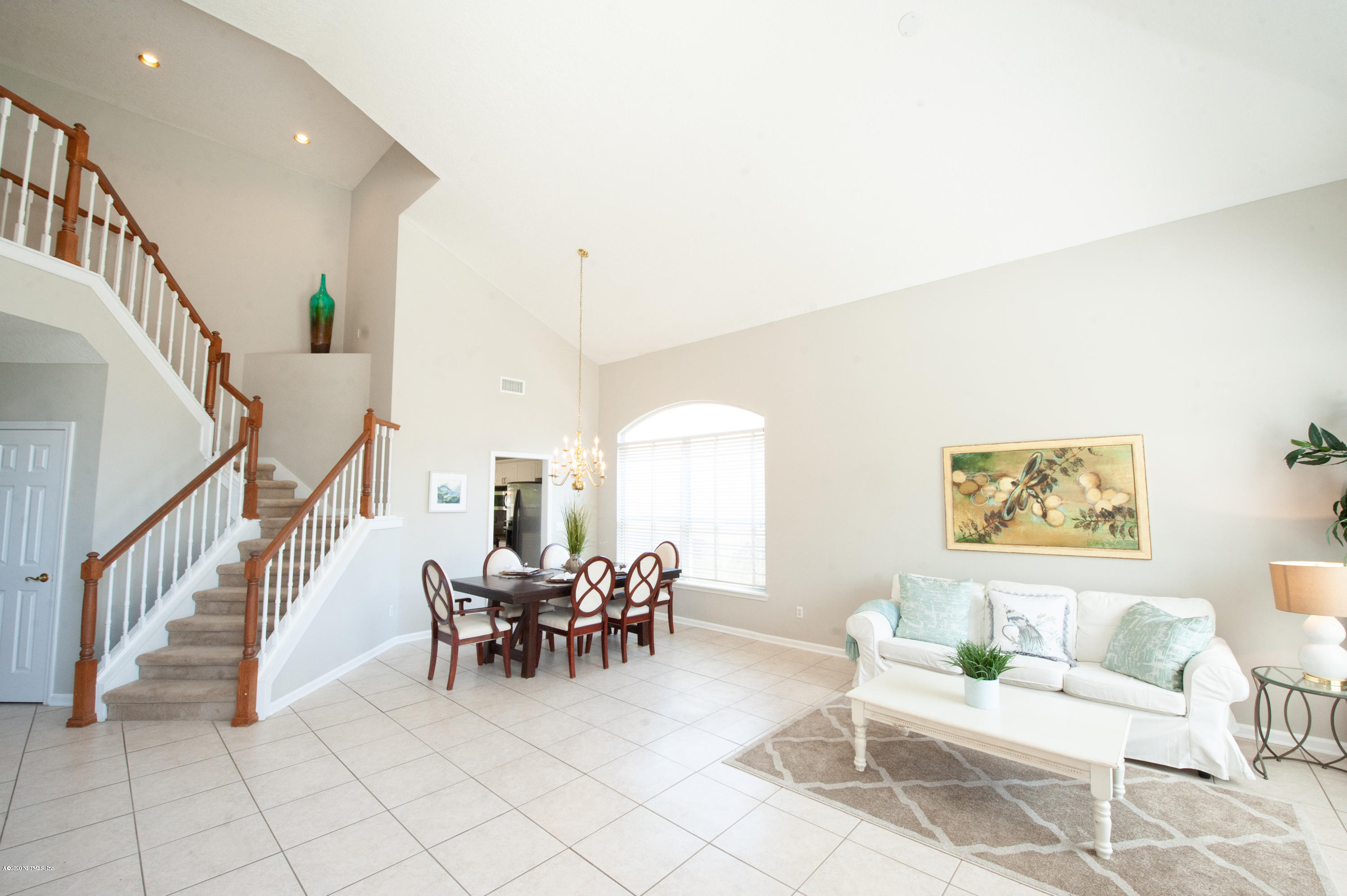 446 Big Tree Road Ponte Vedra Beach, FL 32082 - Photo 3 of 21 a living room with furniture and a painting