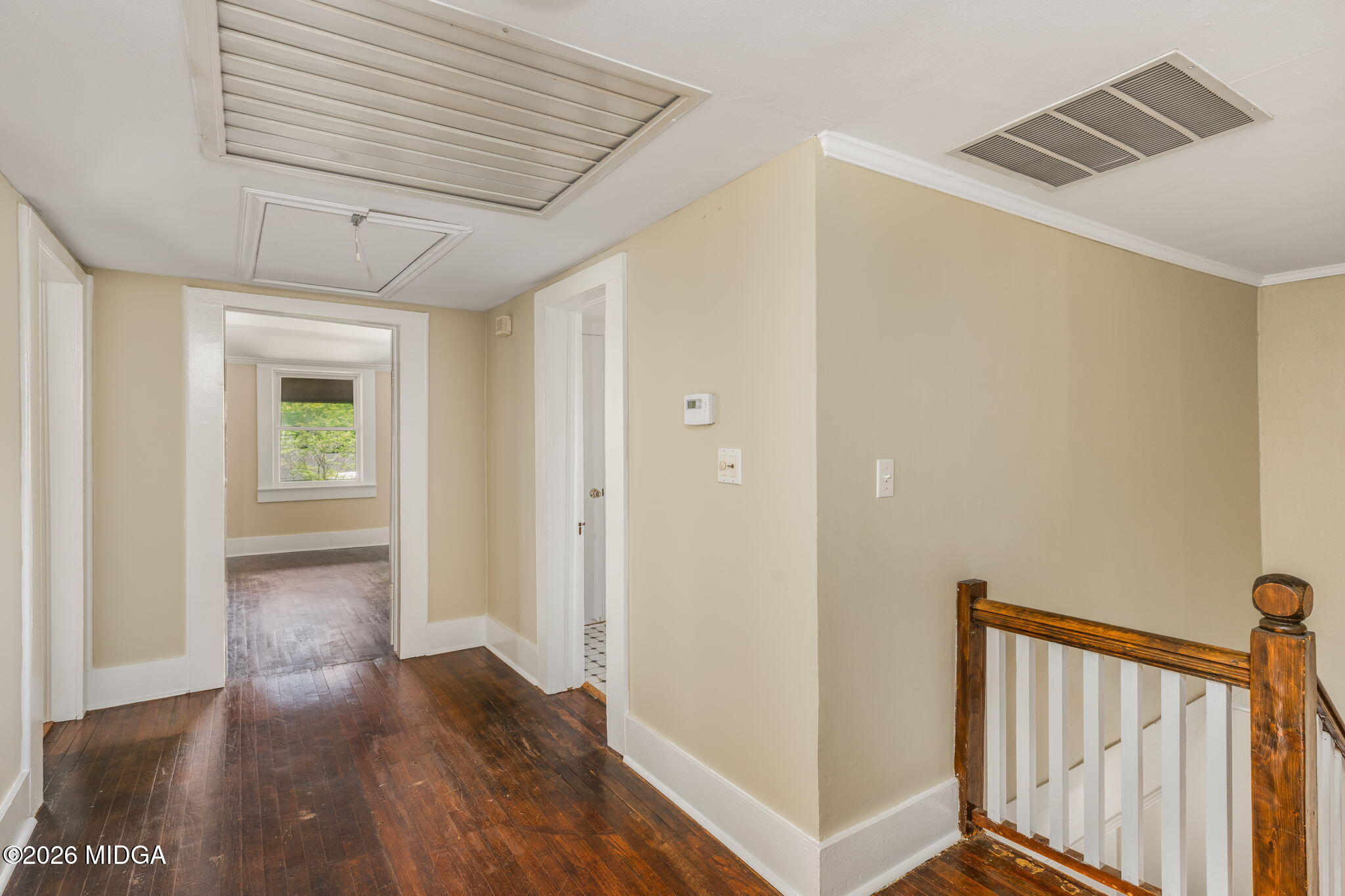 107 Childs Street Gray, GA 31032 - Photo 24 of 37 a view of a hallway with wooden floor