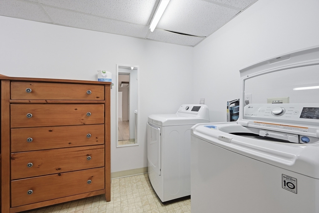1 Belmont Road, Unit 425 West Harwich, MA 02671 - Photo 17 of 27 a utility room with dryer and washer