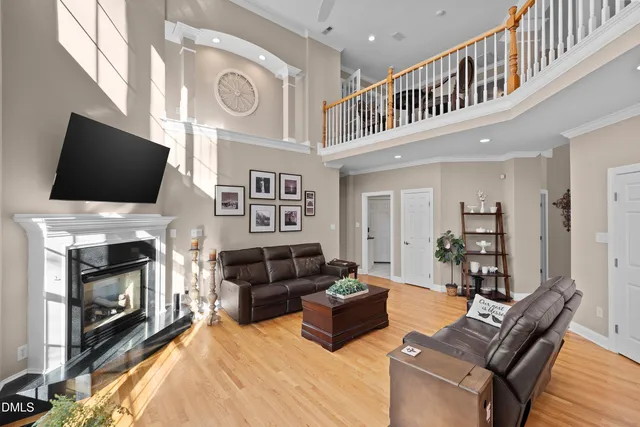 a large kitchen with a table and chairs