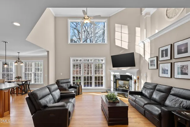 a kitchen with granite countertop a sink stainless steel appliances and cabinets