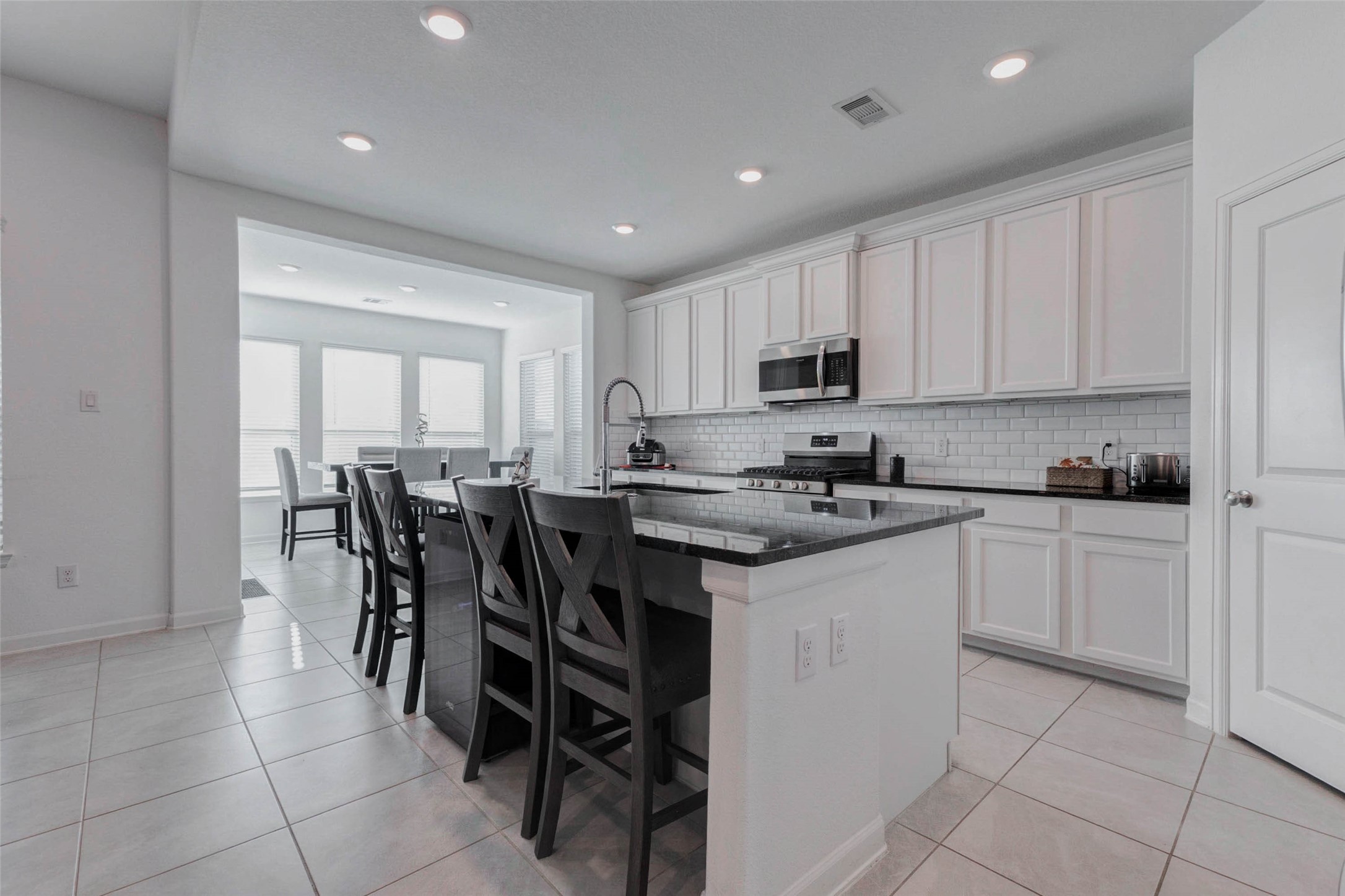 3711 Castle Rock Drive Rosenberg, TX 77469 - Photo 13 of 46 a kitchen with a sink and white cabinets