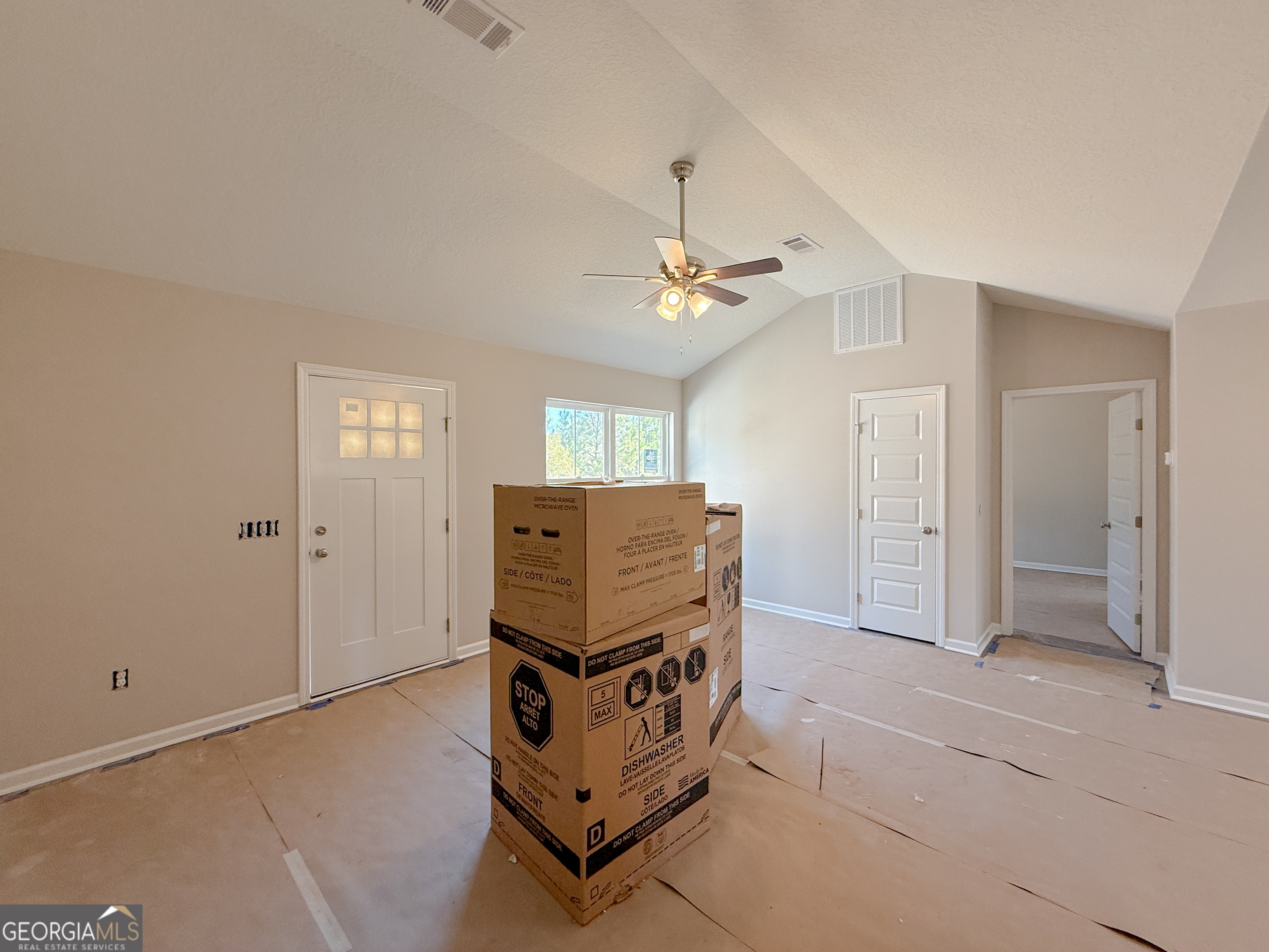 4348 Deloach Church Road Claxton, GA 30417 - Photo 11 of 25 a room with furniture and chandelier
