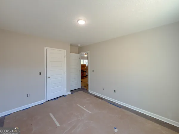 an empty room with closet