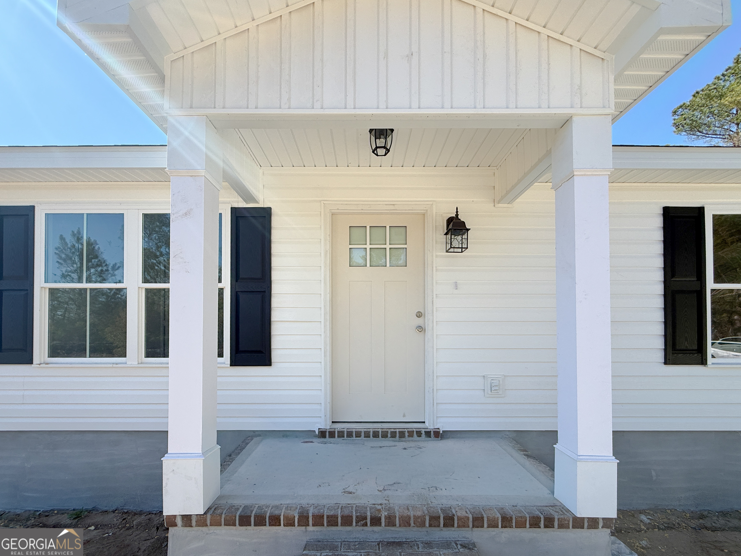 4348 Deloach Church Road Claxton, GA 30417 - Photo 2 of 25 a view of a entryway of the house