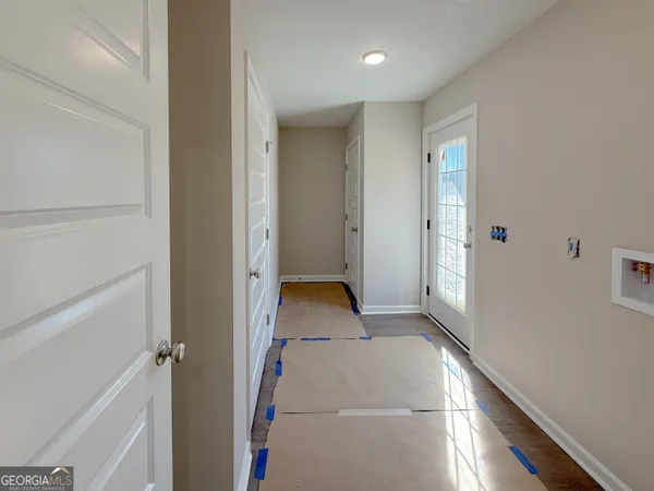 a view of hallway with closet