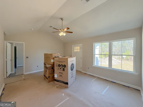 a room with furniture and chandelier