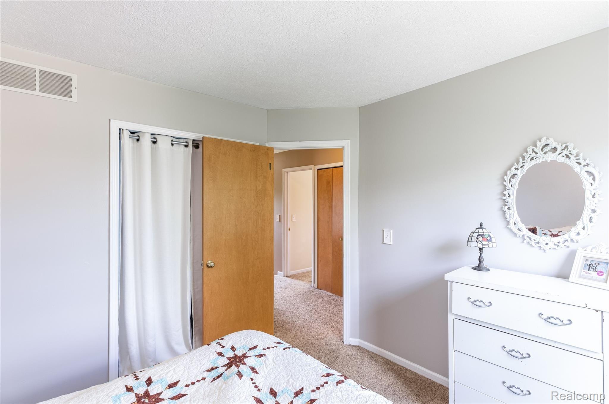 1095 Oakcrest Road Howell, MI 48843 - Photo 18 of 40 27.Bedroom1
