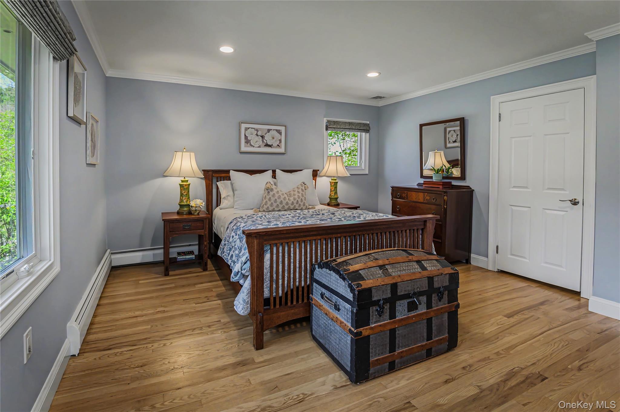 41 Cross Pond Road Pound Ridge, NY 10576 - Photo 21 of 41 a bedroom with furniture and window