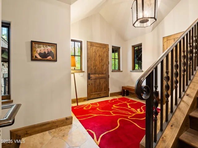 a bedroom with bed and windows