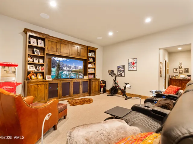 an aerial view of a house with yard and outdoor seating