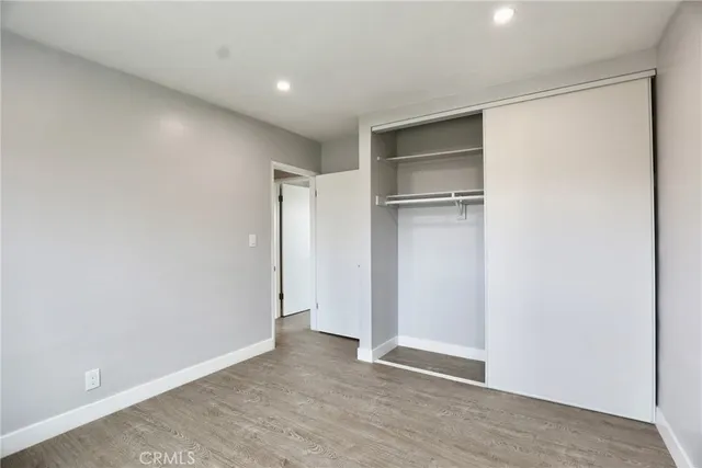 a view of an empty room with a gallery