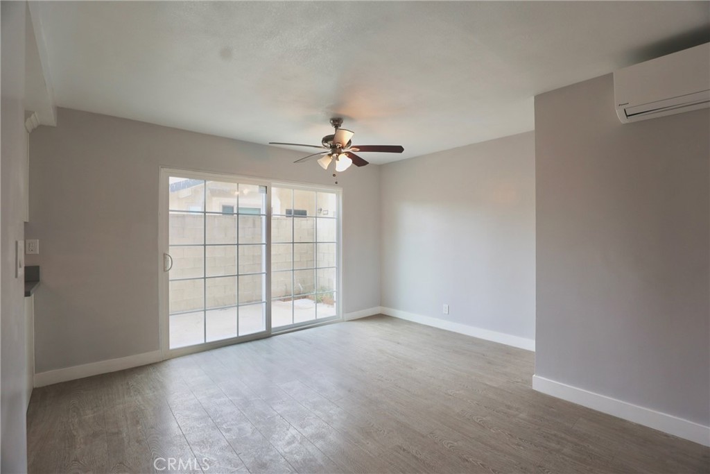 1745 East Woodbury Road Pasadena, CA 91104 - Photo 5 of 18 a view of an empty room with a window