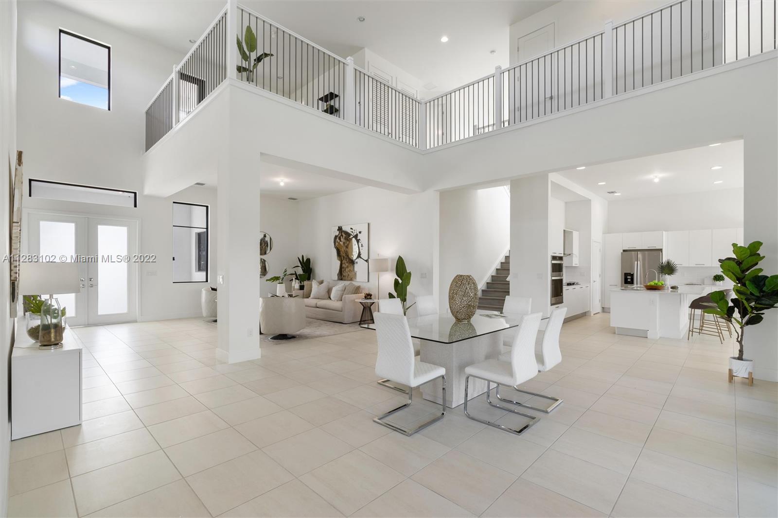 4795 Southwest 159th Avenue Southwest Ranches, FL 33331 - Photo 4 of 35 a lobby with furniture and a potted plant
