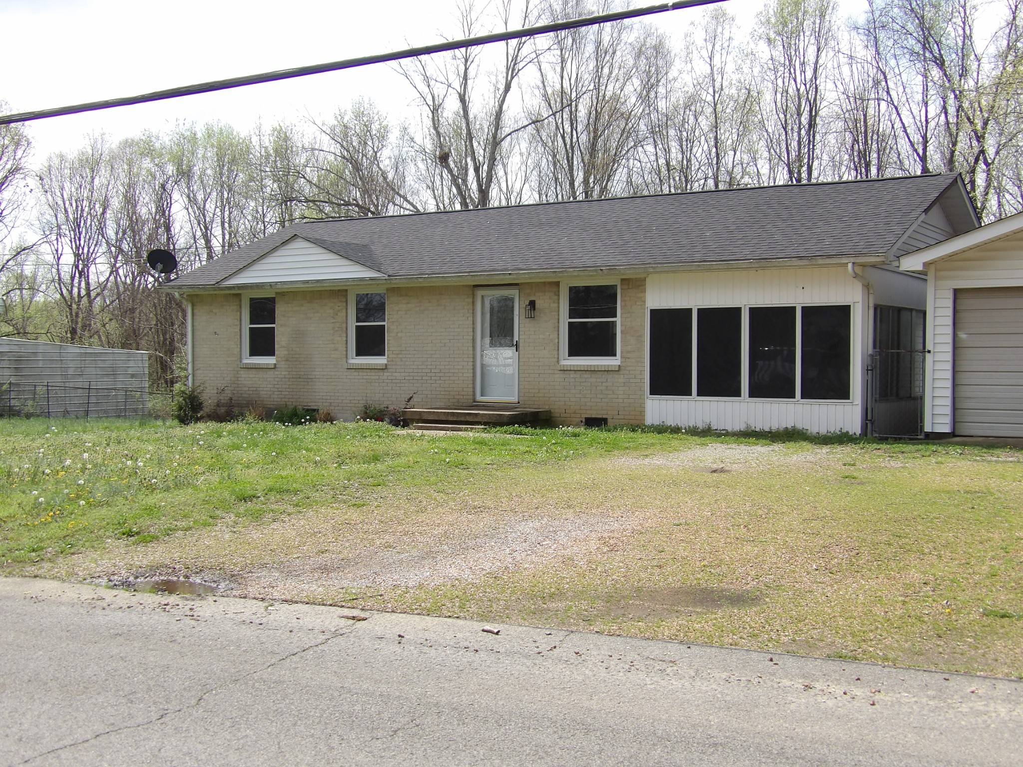 457 East Little Richland Road Waverly, TN 37185 - Photo 12 of 47 a front view of a house with garden