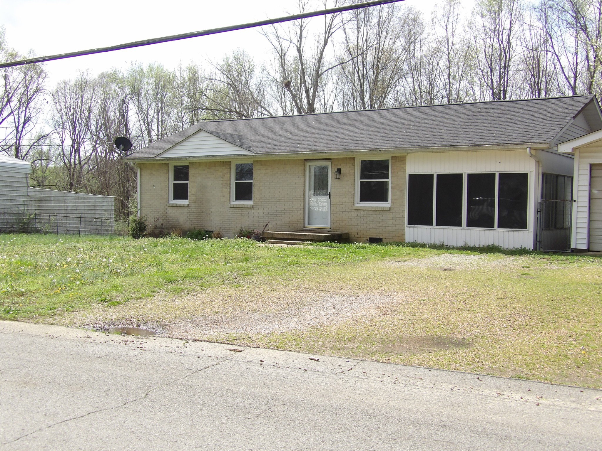 457 East Little Richland Road Waverly, TN 37185 - Photo 13 of 47 a front view of a house with garden