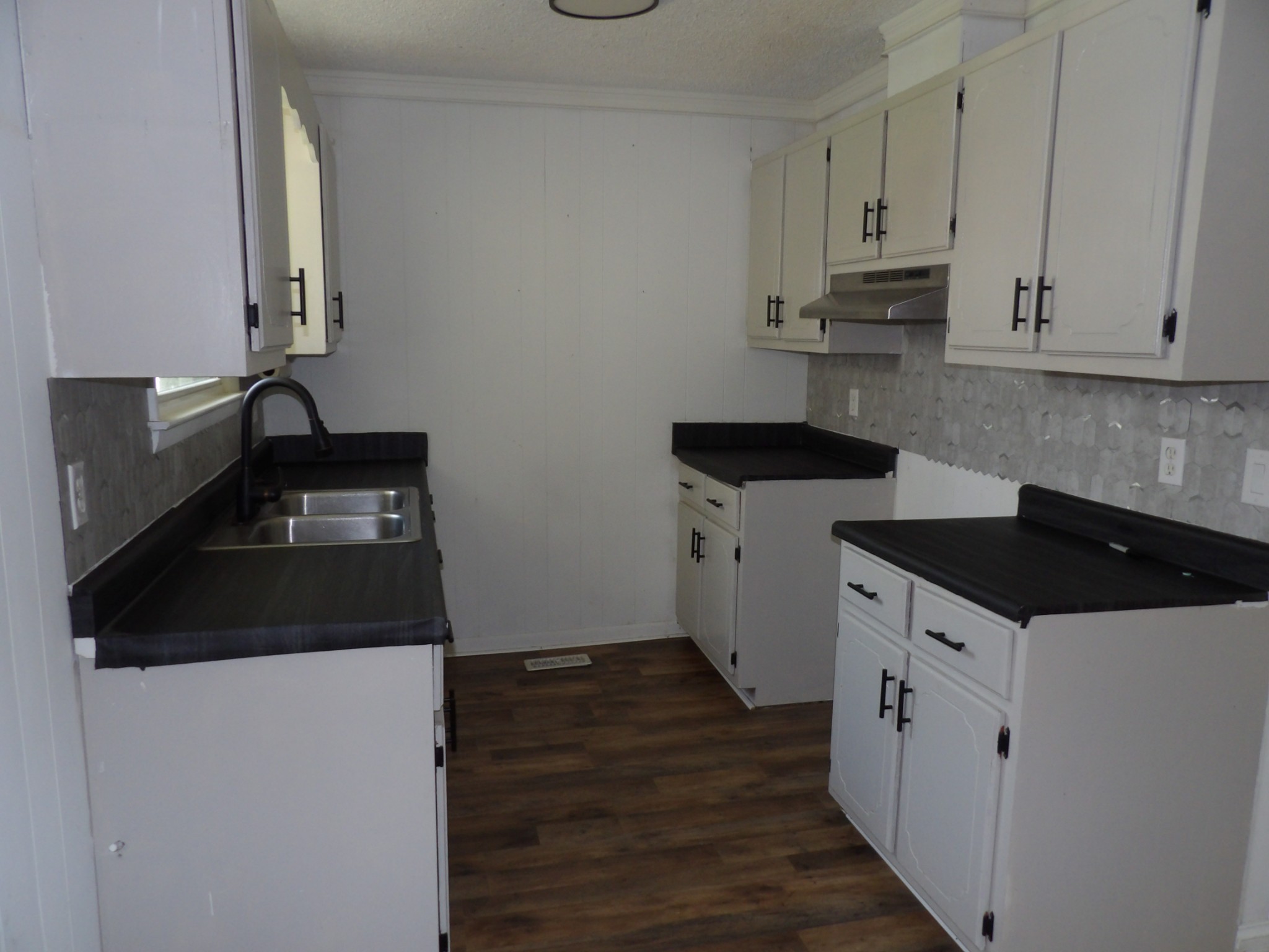 457 East Little Richland Road Waverly, TN 37185 - Photo 24 of 47 a kitchen with granite countertop a stove and a refrigerator