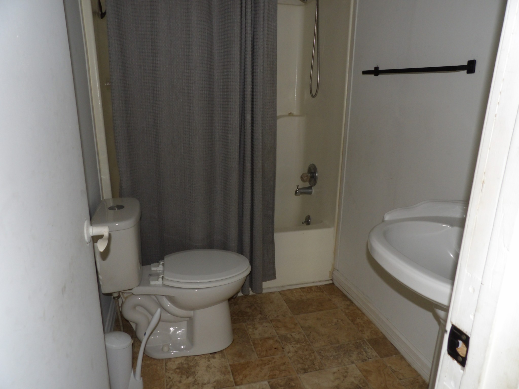 457 East Little Richland Road Waverly, TN 37185 - Photo 41 of 47 a bathroom with a granite countertop toilet and a sink