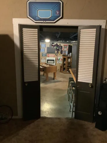 a room with furniture and gym equipment