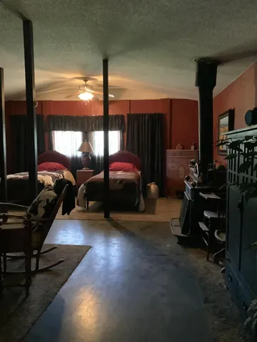 a view of a porch with furniture and a window