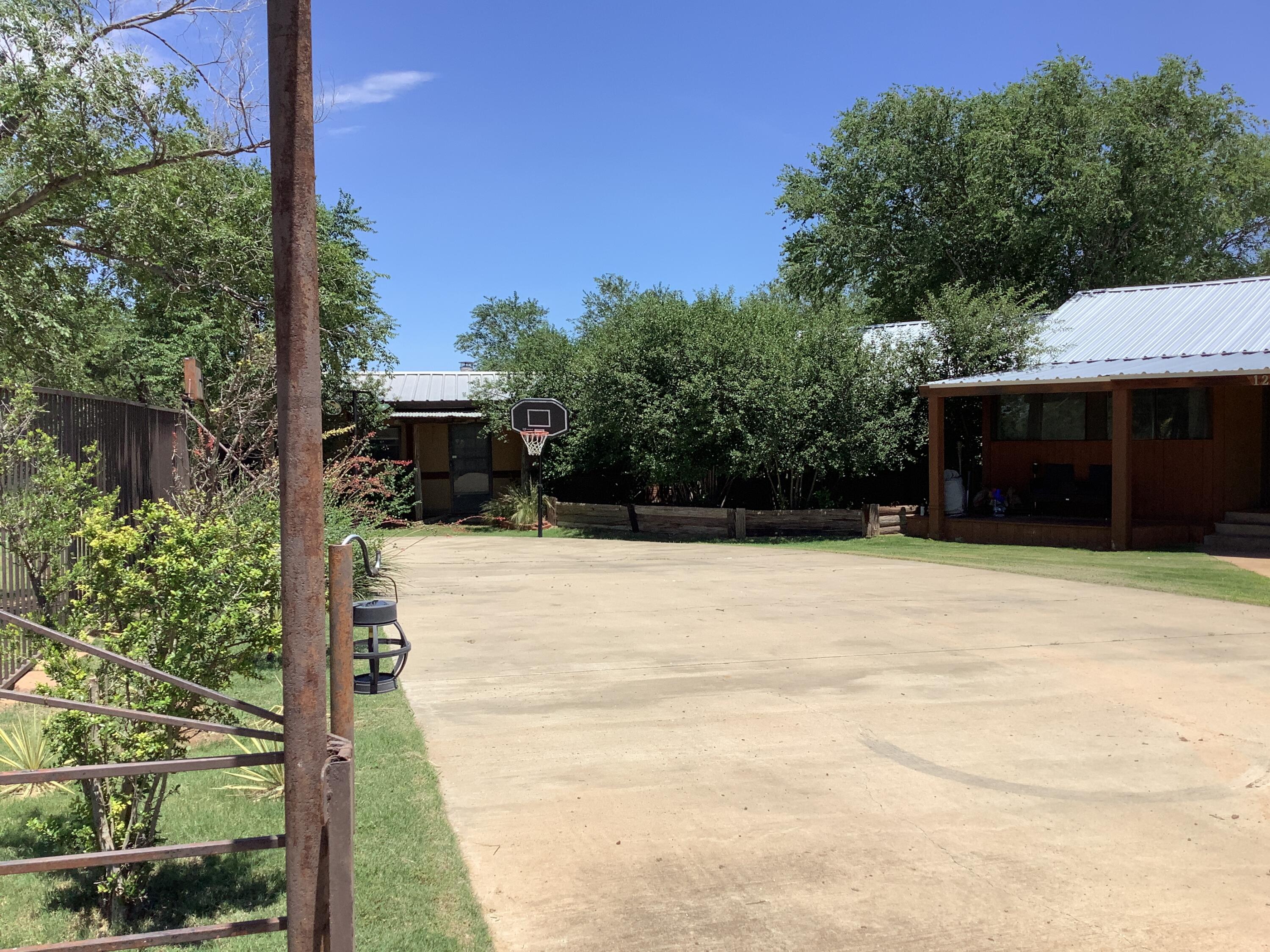 1203 South Date Plainview, TX 79072 - Photo 3 of 53 a view of a backyard