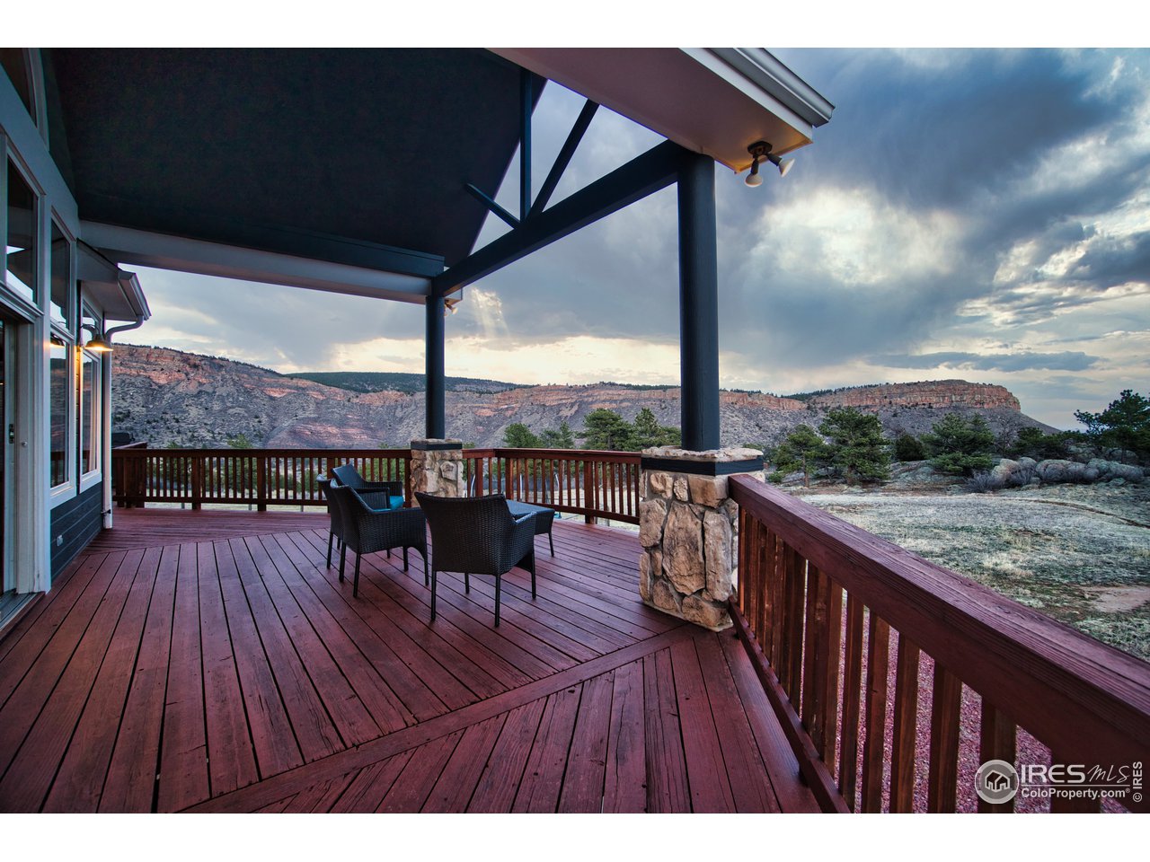700 Apple Ridge Road Lyons, CO 80540 - Photo 18 of 35 Main deck from family room