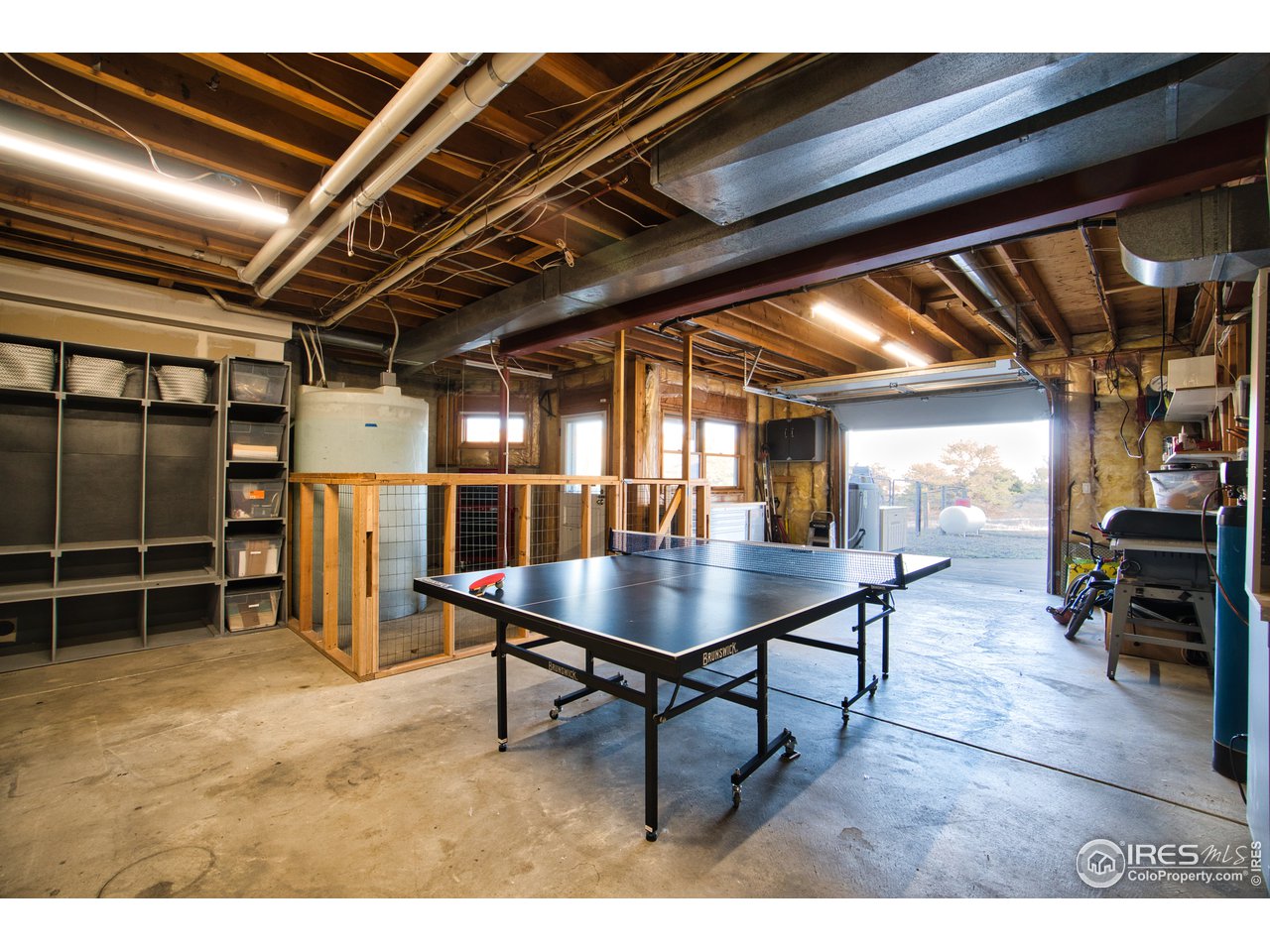 700 Apple Ridge Road Lyons, CO 80540 - Photo 30 of 35 Dream workshop/storage at grade with garage door access