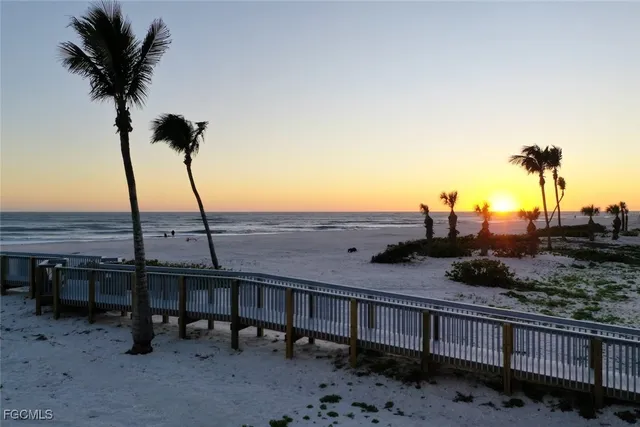 a view of a large building with a yard