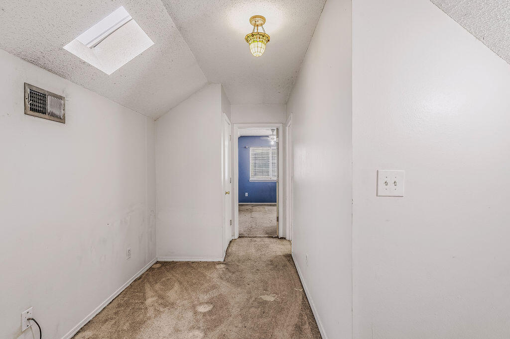53 4th Street Shalimar, FL 32579 - Photo 19 of 47 a view of a hallway with a window