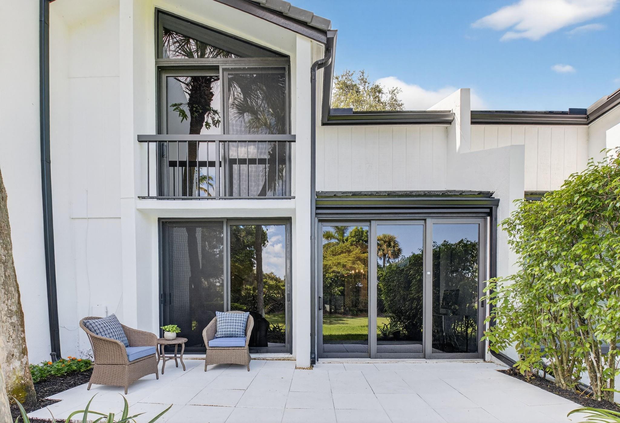 a view of a two chair in the balcony