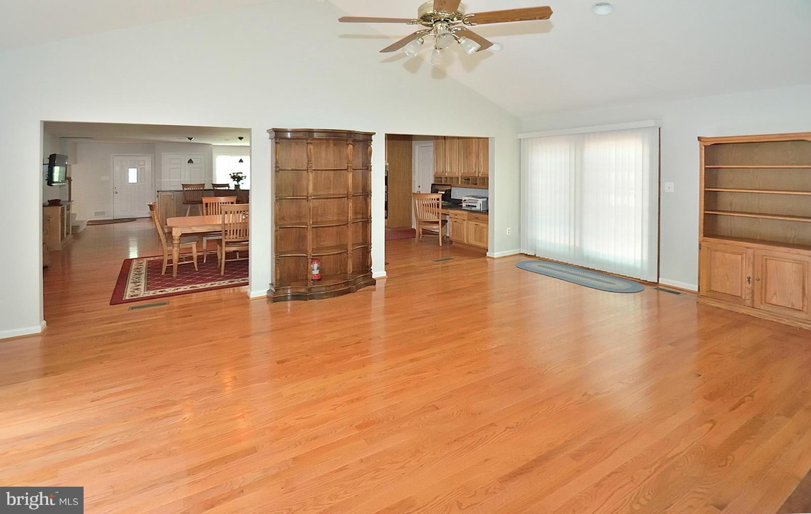 11626 Ayreshire Road Oakton, VA 22124 - Photo 13 of 26 Great Room has 12 feet ceiling and Large Fan.