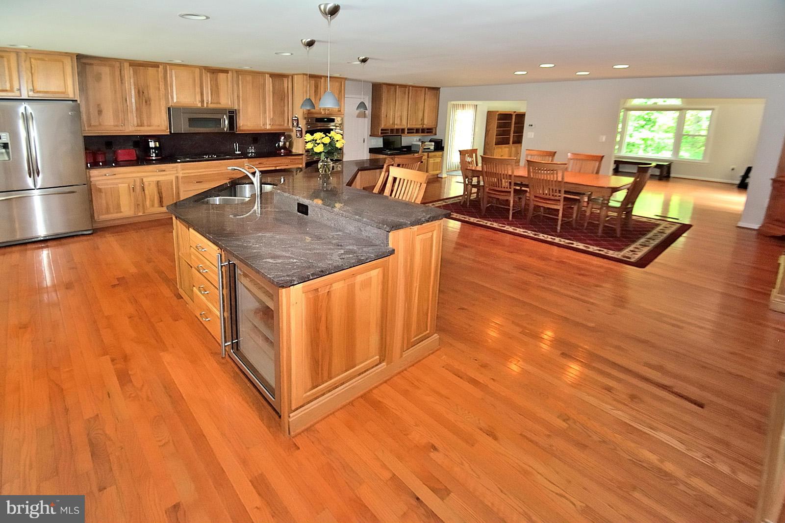 5 Burner gas cook top. 42" Cedar Birch Cabinetry.