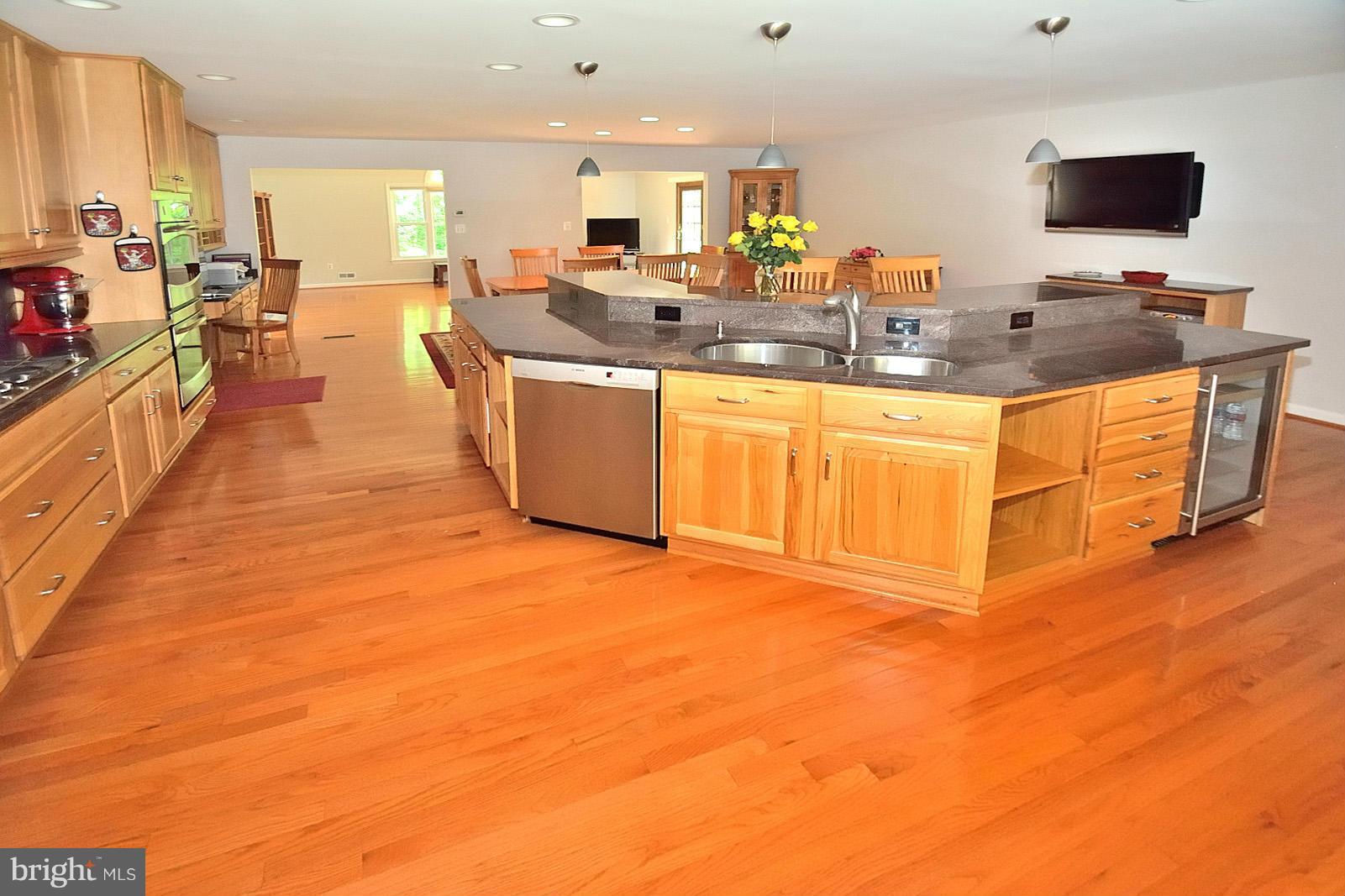 Open Kitchen with Golden Oak HW floors
