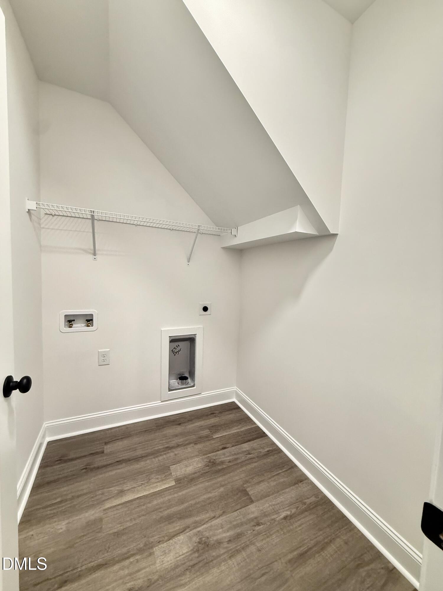 10300 Stallings Road Spring Hope, NC 27882 - Photo 10 of 36 a view of a room with wooden floor